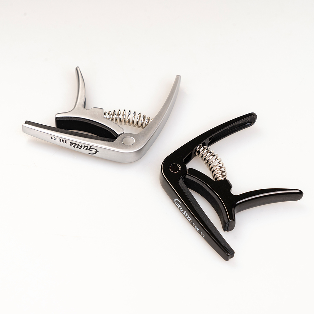 GUITTO GGC-07 Ukulele Capo Qui - Musical Instrument Types ulasan dan harga